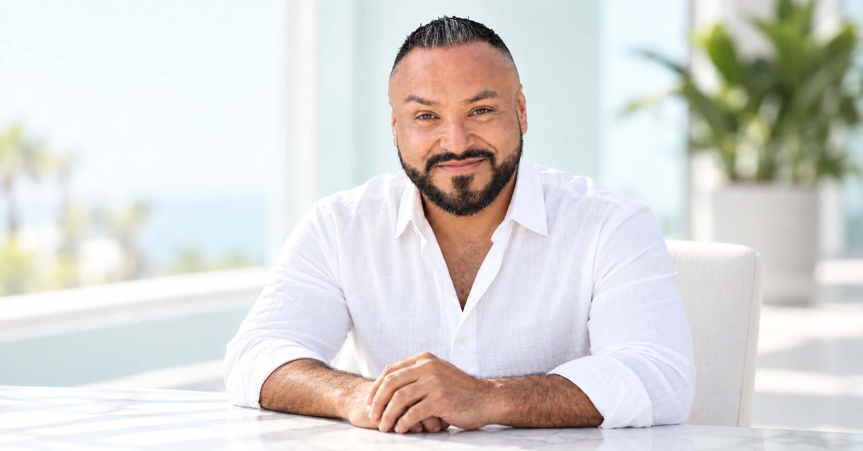 Charlie Silva, founder of Fast Divorce, seated at a table