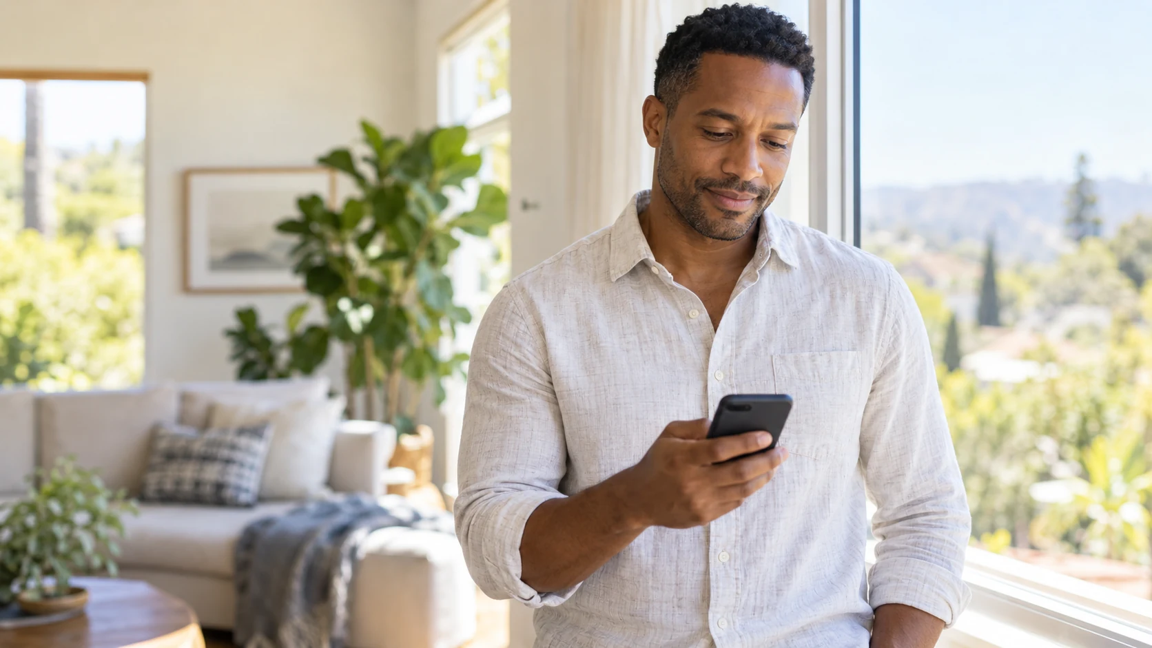 A man checking his phone while out